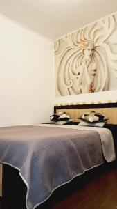 Katil atau katil-katil dalam bilik di Bucharest Great Luxury ApartHotel ParkLake