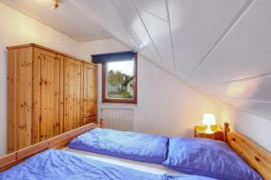 Seepark Kirchheim Ferienhaus bei Zeta mit Sauna 객실 침대