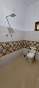 Koupelna v ubytování Shiven Homestay