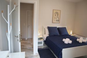 Posteľ alebo postele v izbe v ubytovaní Catherine's Comfort Apartment No1