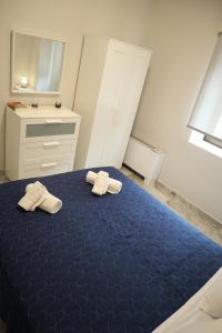Posteľ alebo postele v izbe v ubytovaní Catherine's Comfort Apartment No1