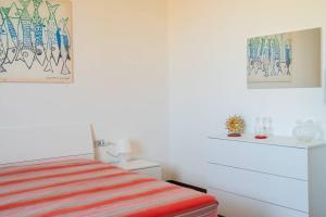 Postel nebo postele na pokoji v ubytování Casa zio Masi