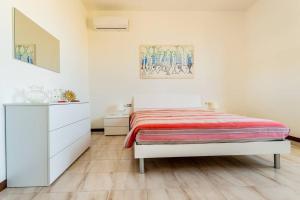 Postel nebo postele na pokoji v ubytování Casa zio Masi