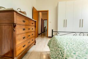 Postel nebo postele na pokoji v ubytování Casa zio Masi