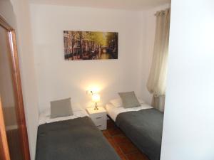 A bed or beds in a room at Atiko La Vista