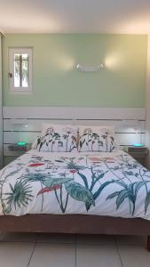 Кровать или кровати в номере Le Malpas Kingfisher