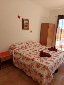 Postel nebo postele na pokoji v ubytování STELLA MARINA - IUN Q4042