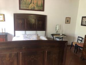 Ein Bett oder Betten in einem Zimmer der Unterkunft Casa indipendente in paese con giardino