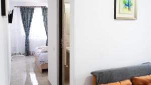 Postel nebo postele na pokoji v ubytování Cazare Vila GOG - Rm Valcea-Salina Ocnele Mari