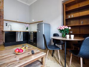 Kuchyňa alebo kuchynka v ubytovaní CracWoW Market Squere Apartment