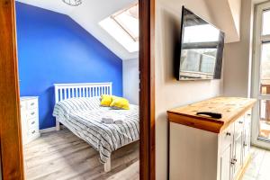 Postel nebo postele na pokoji v ubytování Rentimi - Apartament Skandynawski 1