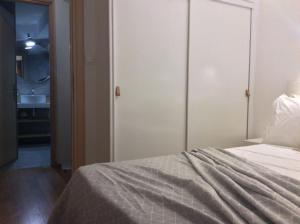 Posteľ alebo postele v izbe v ubytovaní Evia Greece Summer Suites - Halkidiki Suites Com