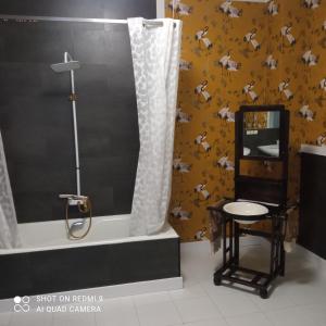 Koupelna v ubytování Apartamentos Baeza RN + 35 fotografií