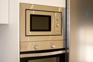 A kitchen or kitchenette at Manilva Townhouse with spectacular views of Gibraltar