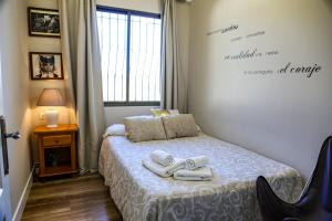 Postel nebo postele na pokoji v ubytování Apartamentos Baeza RN