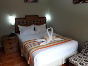 Voodi või voodid majutusasutuse Hostal Vista Waynapata 123 toas