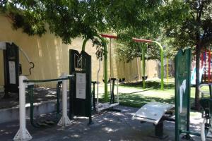 a park with a bunch of gates and a playground at Acogedor Departamento con estacionamiento gratuito in Monterrey