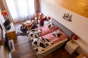 Postel nebo postele na pokoji v ubytování Chalet-Hotel Beau-Site