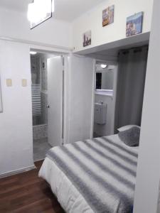 Postel nebo postele na pokoji v ubytování Hostal Casamar-Viña 5 norte 1061