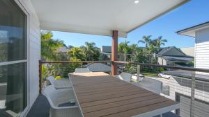 
a patio with a view of the ocean at Moby Dick Waterfront Resort Motel in Yamba
