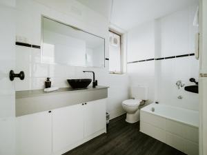 Ванна кімната в SoYa Apartment Hotel