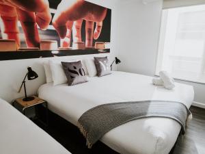 Lova arba lovos apgyvendinimo įstaigoje SoYa Apartment Hotel