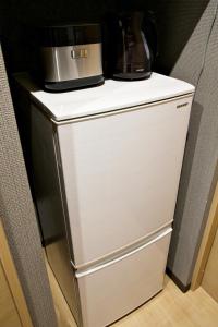 Dapur atau dapur kecil di メイスン倶楽部 安里 3階