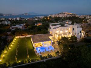 a large building with a lot of windows at Calacala Rooms & Farm Experience in Procida