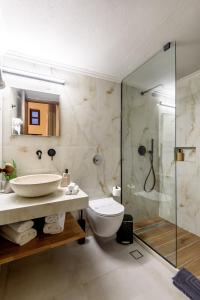 Koupelna v ubytování Porto Del Colombo Traditional Boutique Hotel