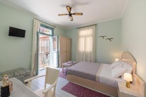 Postel nebo postele na pokoji v ubytování 999 Luxury Hotel