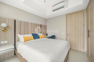Vue by Kozystay - Karawaci客房内的一张或多张床位