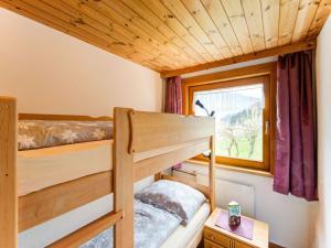 Voodi või voodid majutusasutuse Apartment Kaltenbach near Ski Paradise toas