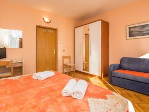 Postel nebo postele na pokoji v ubytování Apartment on Vir Island near Sandy Beaches