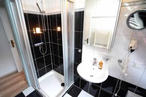 Ein Badezimmer in der Unterkunft Ferienwohnung Langeoog