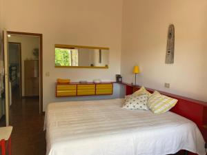A bed or beds in a room at La Casa di Paola