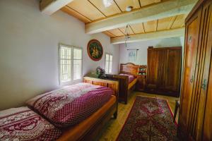 Tempat tidur dalam kamar di Chaloupka Prischlop
