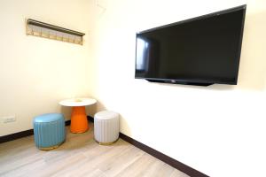 TV a/nebo společenská místnost v ubytování 享悅電梯民宿