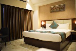 Hotel The Grand Chittor, Chittorgarh客房内的一张或多张床位