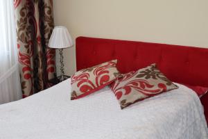 Posteľ alebo postele v izbe v ubytovaní Apartament Galeria Warmińska