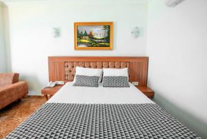 Postel nebo postele na pokoji v ubytování Kristal Beach Hotel