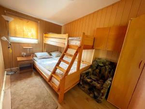 Giường trong phòng chung tại Domki Rodzinny Wypoczynek