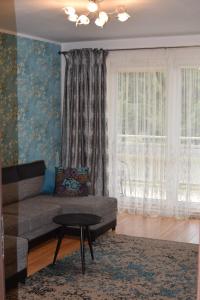 Posedenie v ubytovaní Apartament Galeria Warmińska