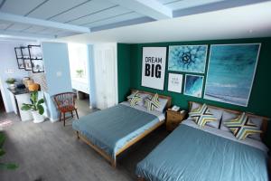 Postel nebo postele na pokoji v ubytování Sleep Box Hostel Phú Quốc