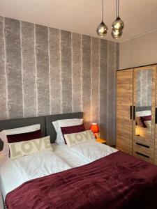 Posteľ alebo postele v izbe v ubytovaní Apartment 07 Uniejów