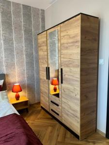 Posteľ alebo postele v izbe v ubytovaní Apartment 07 Uniejów