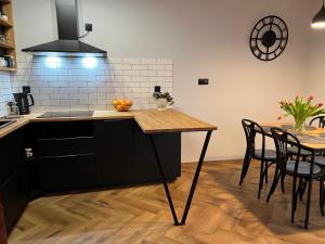 Kuchyňa alebo kuchynka v ubytovaní Apartment 07 Uniejów