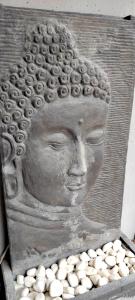 a statue with a bunch of white balls around it at Les plages du Grand Vallen - Résidence Château Leenhardt in Le Grau-du-Roi