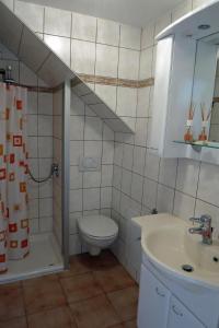 Ванная комната в Ferienwohnung Schlesinger