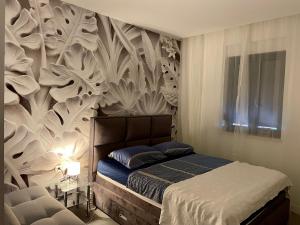 Posteľ alebo postele v izbe v ubytovaní Apartments Fortes Fortuna