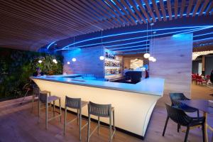Hol lub bar w obiekcie Les Dunes Suites